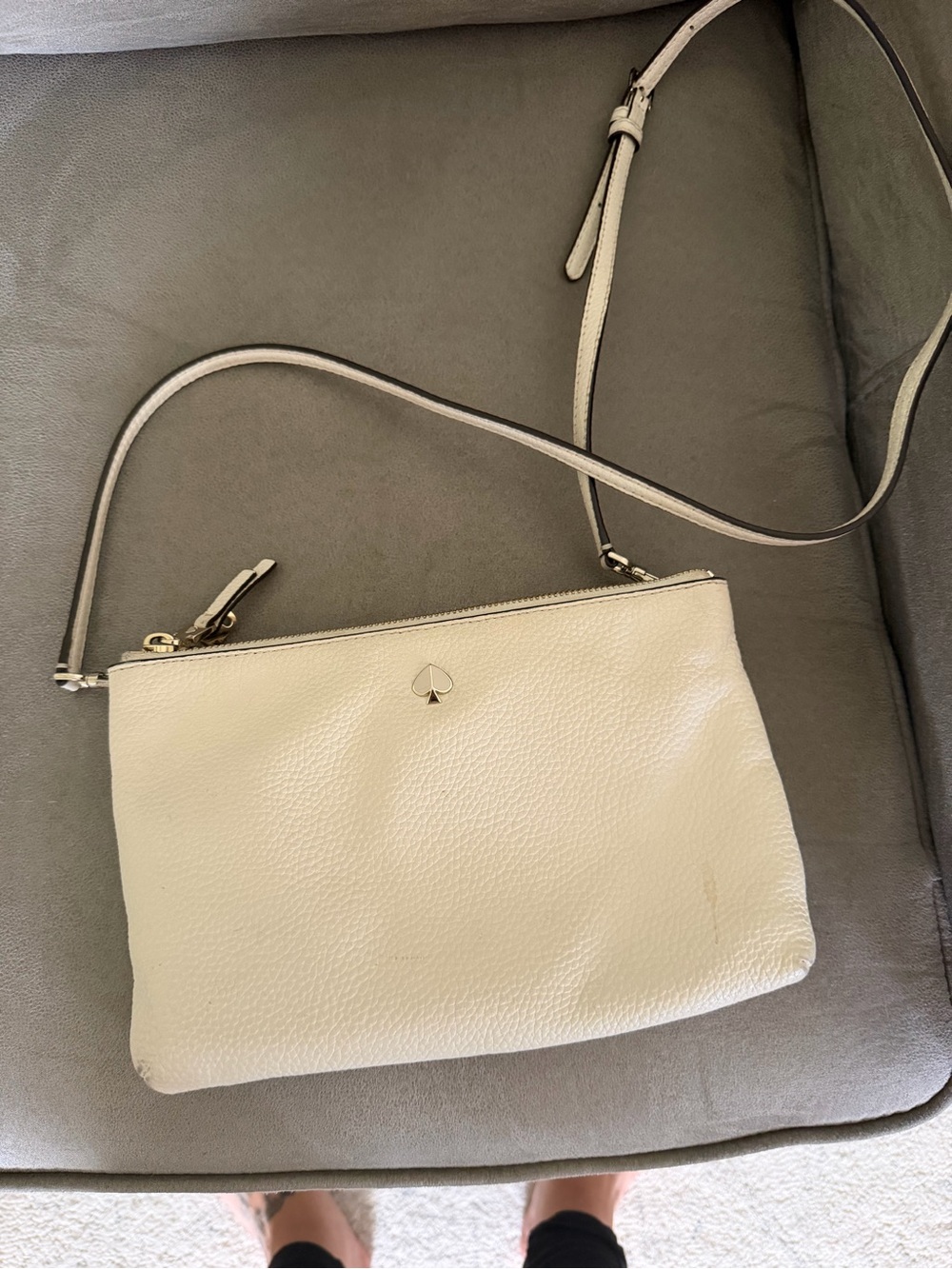 kate spade cream pebbled leather crossbody with gold spade emblem
